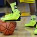 The Michigan men's basketball team show off some neon shoes during media day at the Player Development Center on Wednesday. Melanie Maxwell I AnnArbor.com
